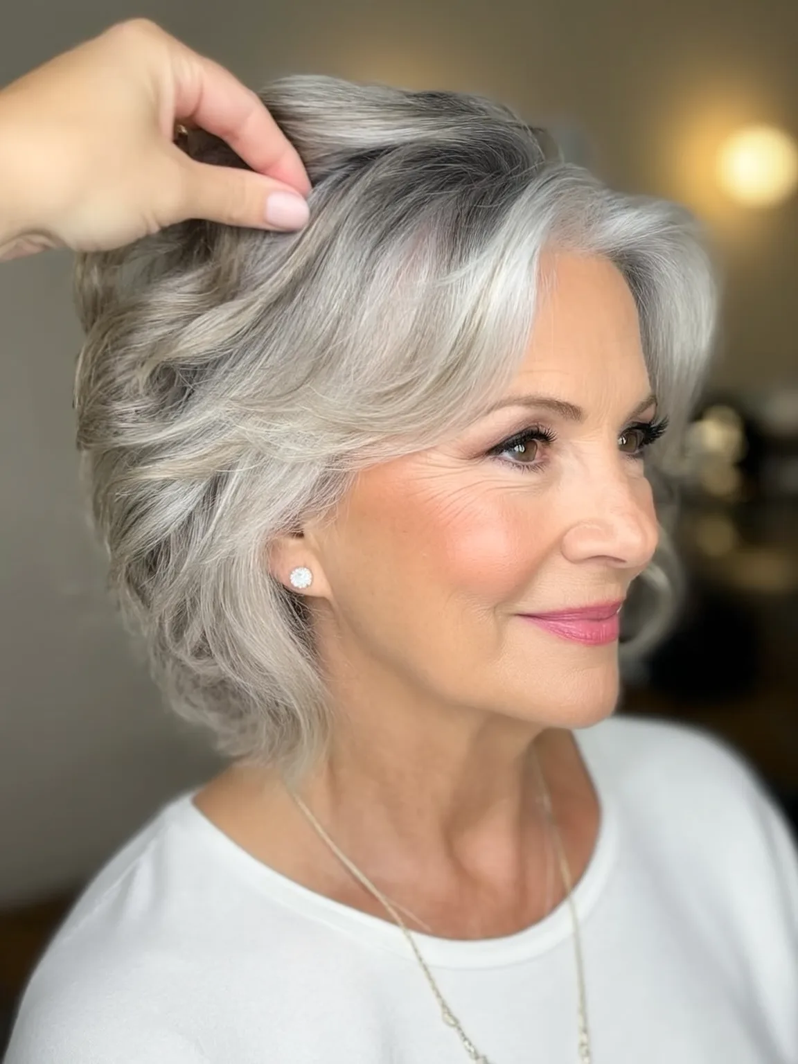 Feathered Shoulder-Length Silver Cut with Natural Sheen